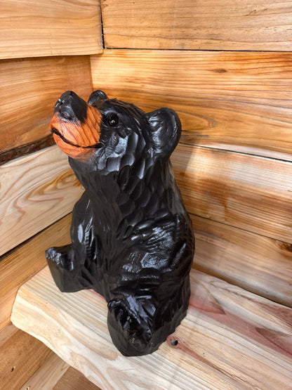 Sitting Black Bear Looking Up – 15” Chainsaw Carving