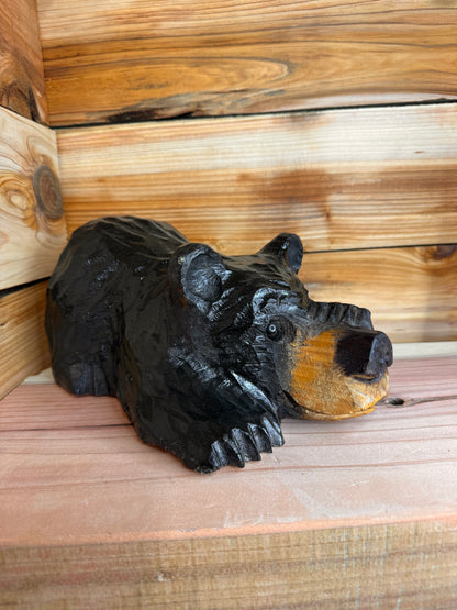 Chainsaw Carved Black Bear Peeking with Paw Over Eye – 10”
