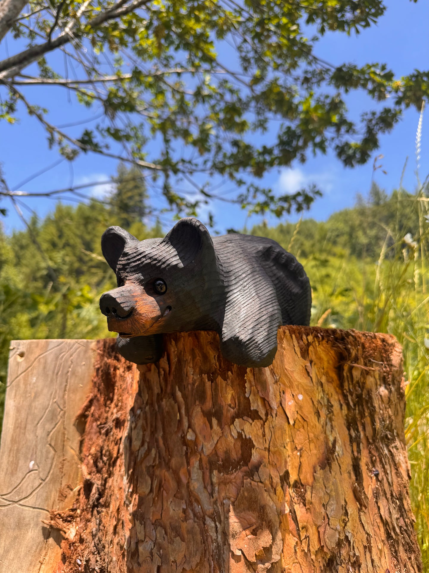 Chainsaw Carved Black Mantle Bear with Hanging Paws – 10”