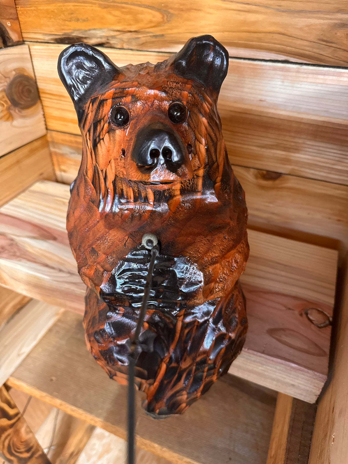 Chainsaw Carved Brown Bear Sitting on Ledge with Fishing Pole – 15”