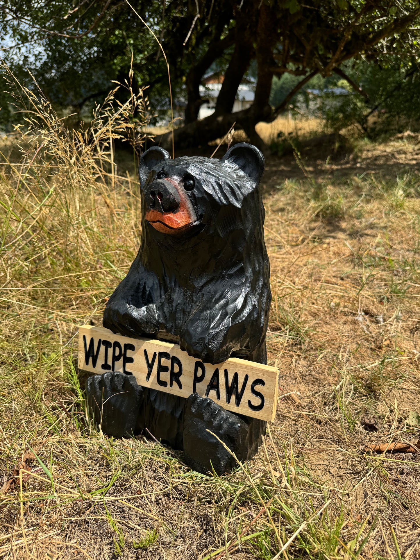 Wood Carved Bear Holding Reversible Welcome Sign - Customizable, 15 Inches Tall - Black