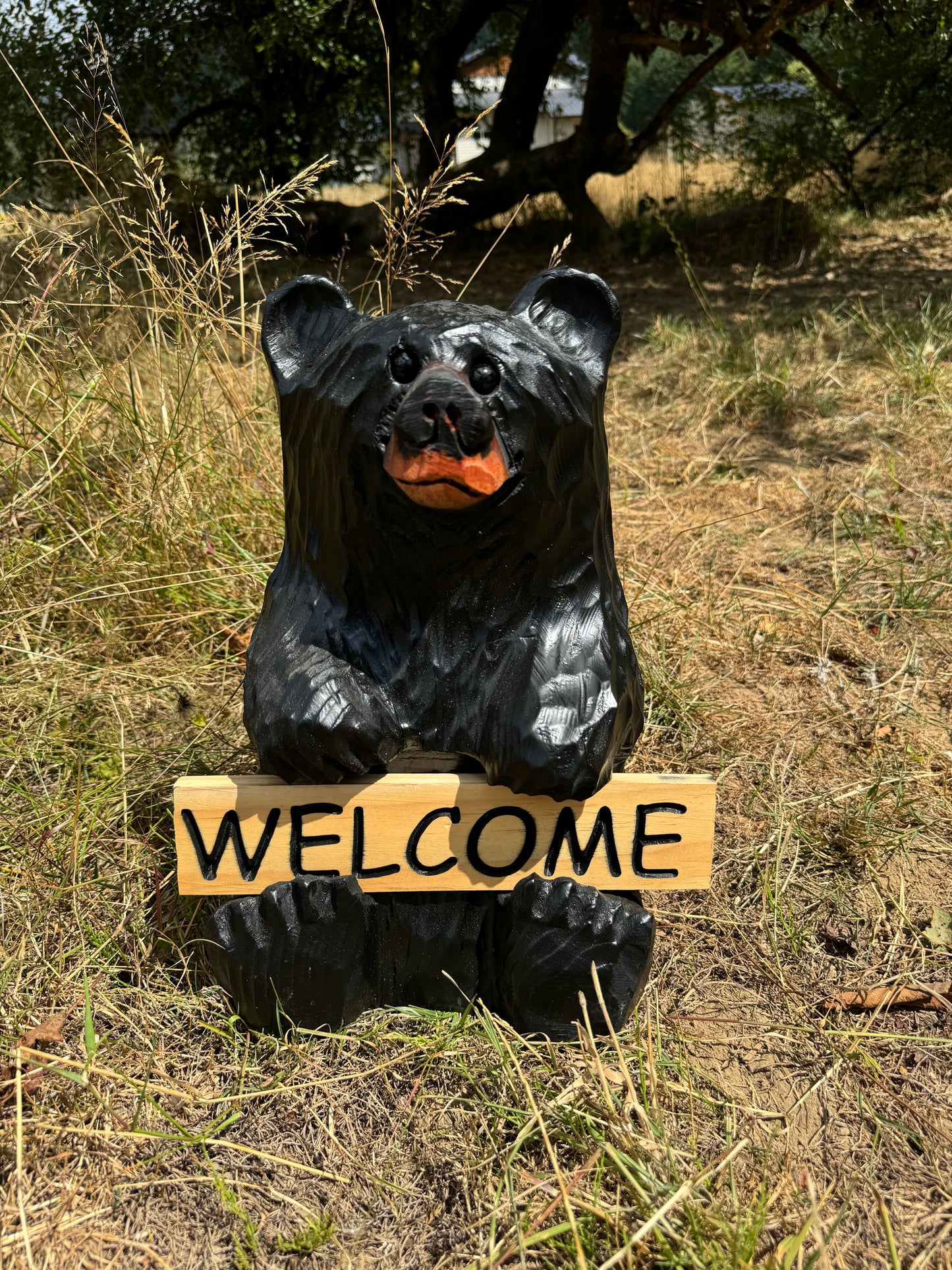 Wood Carved Bear Holding Reversible Welcome Sign - Customizable, 15 Inches Tall - Black