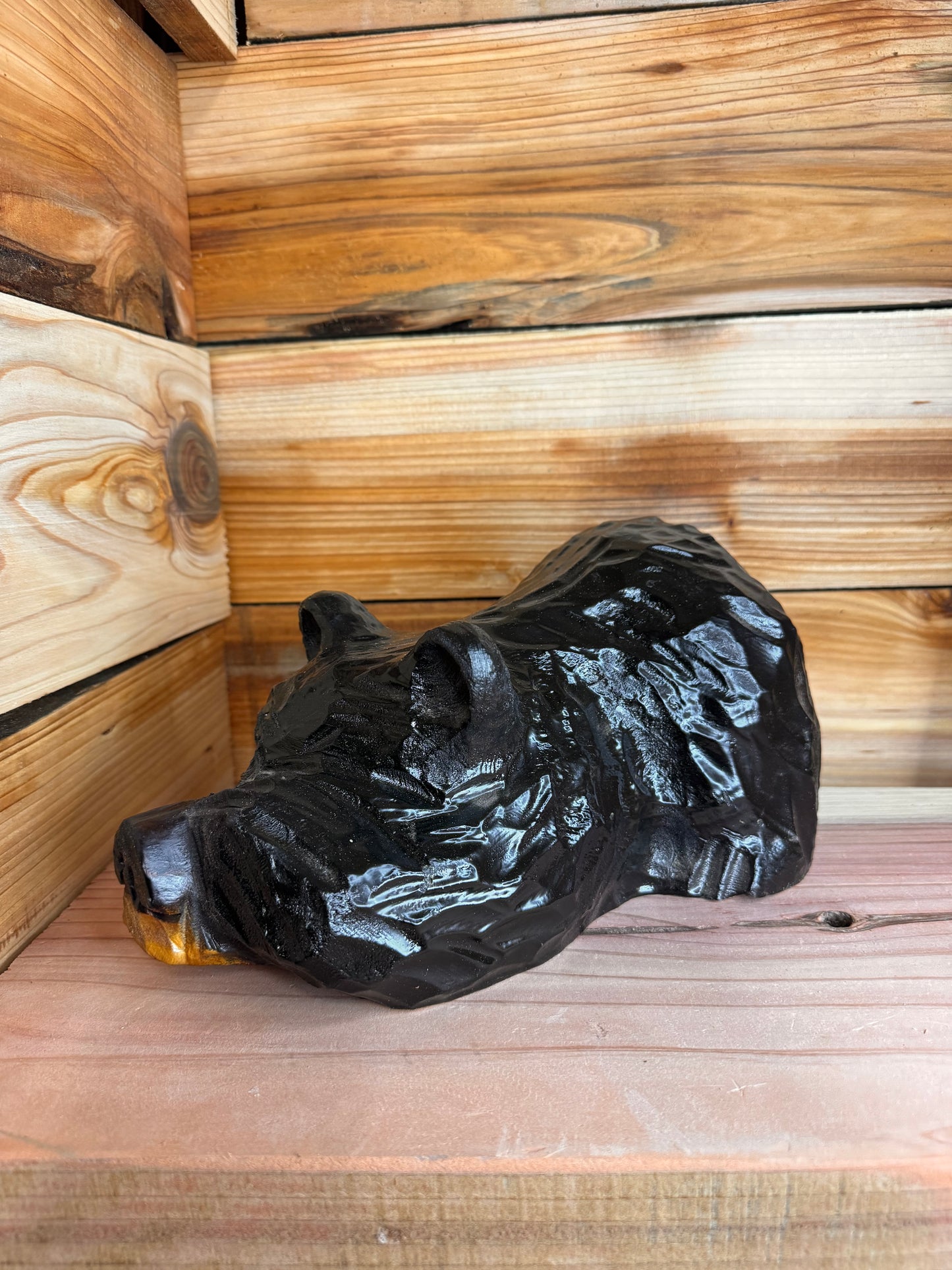 Chainsaw Carved Black Bear Peeking with Paw Over Eye – 10”