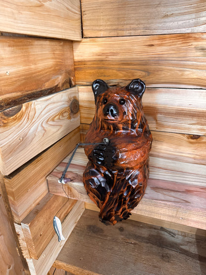 Chainsaw Carved Brown Bear Sitting on Ledge with Fishing Pole – 15”