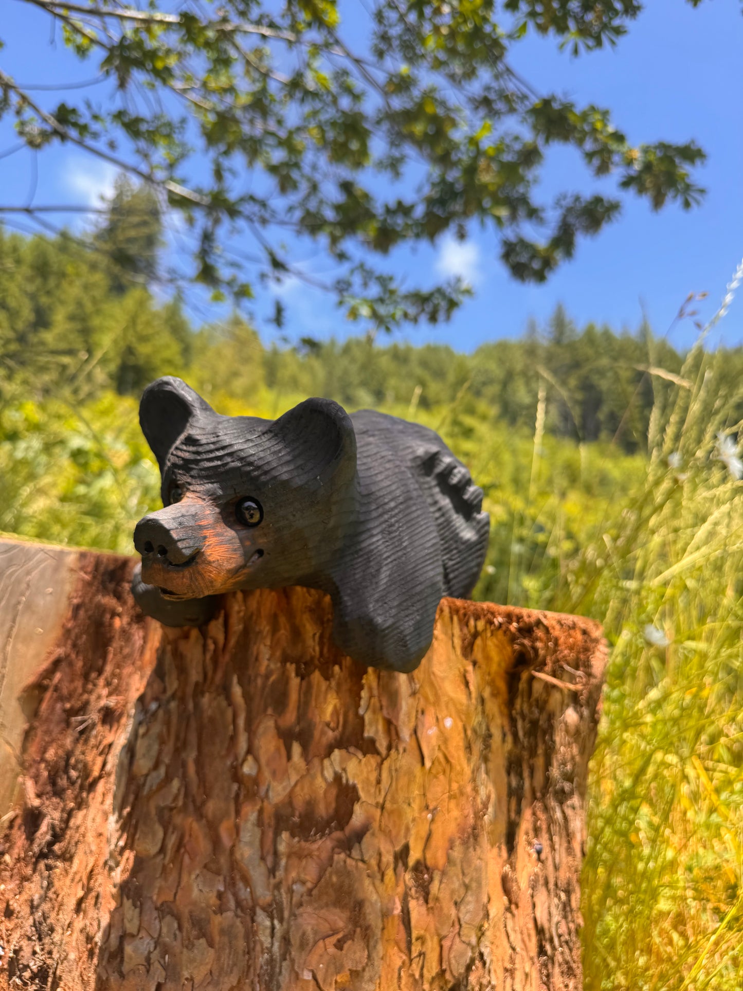 Chainsaw Carved Black Mantle Bear with Hanging Paws – 10”
