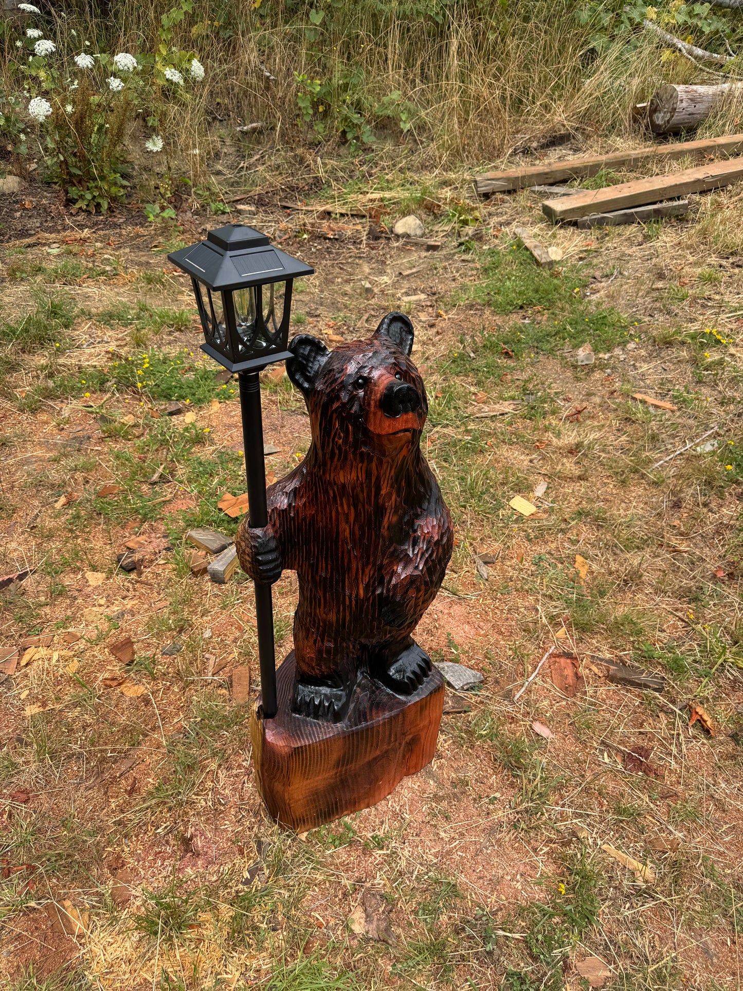 Chainsaw Carved Redwood Bear with Solar Lantern – 42 Inches Brown