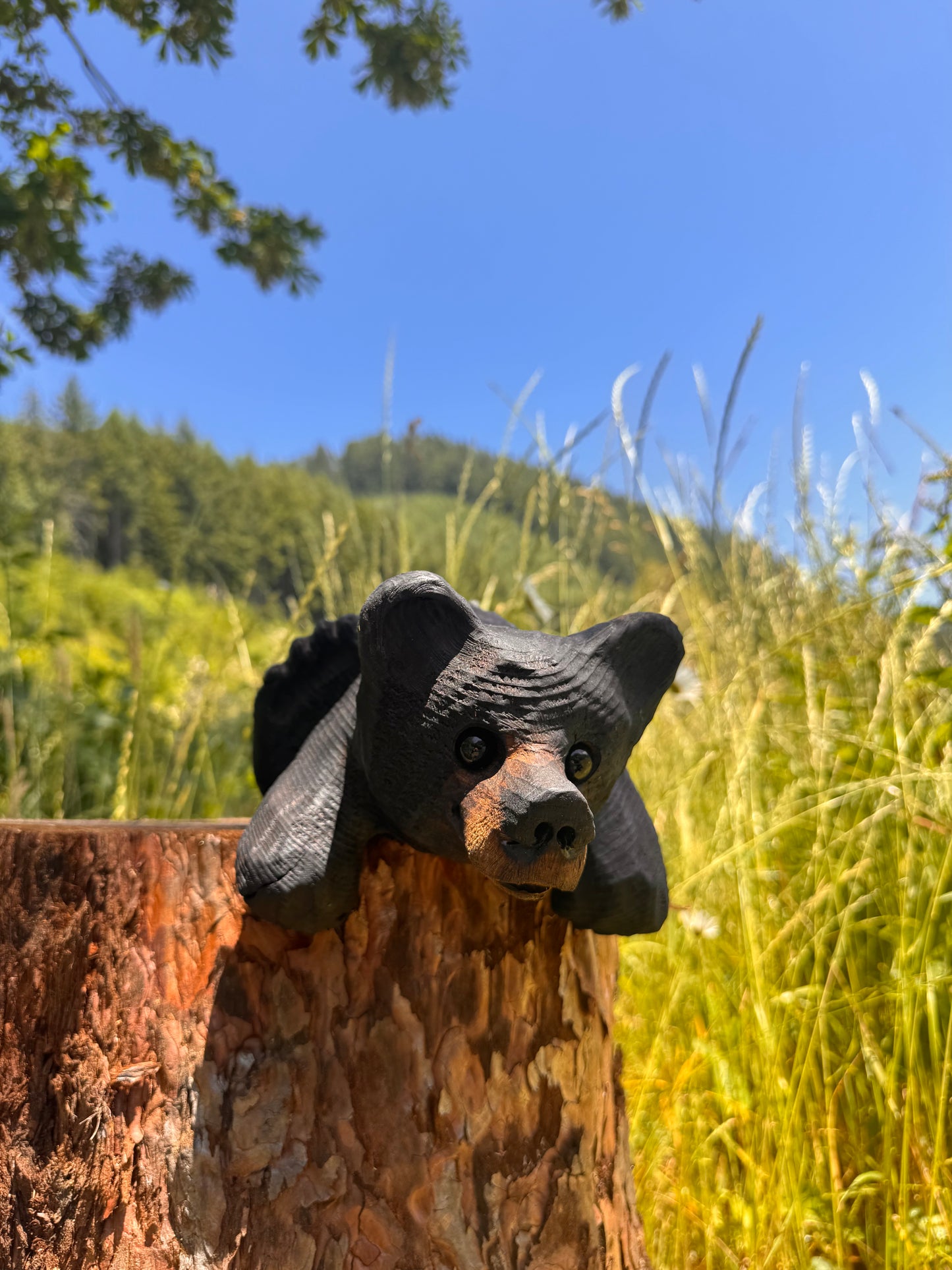 Chainsaw Carved Black Mantle Bear with Hanging Paws – 10”